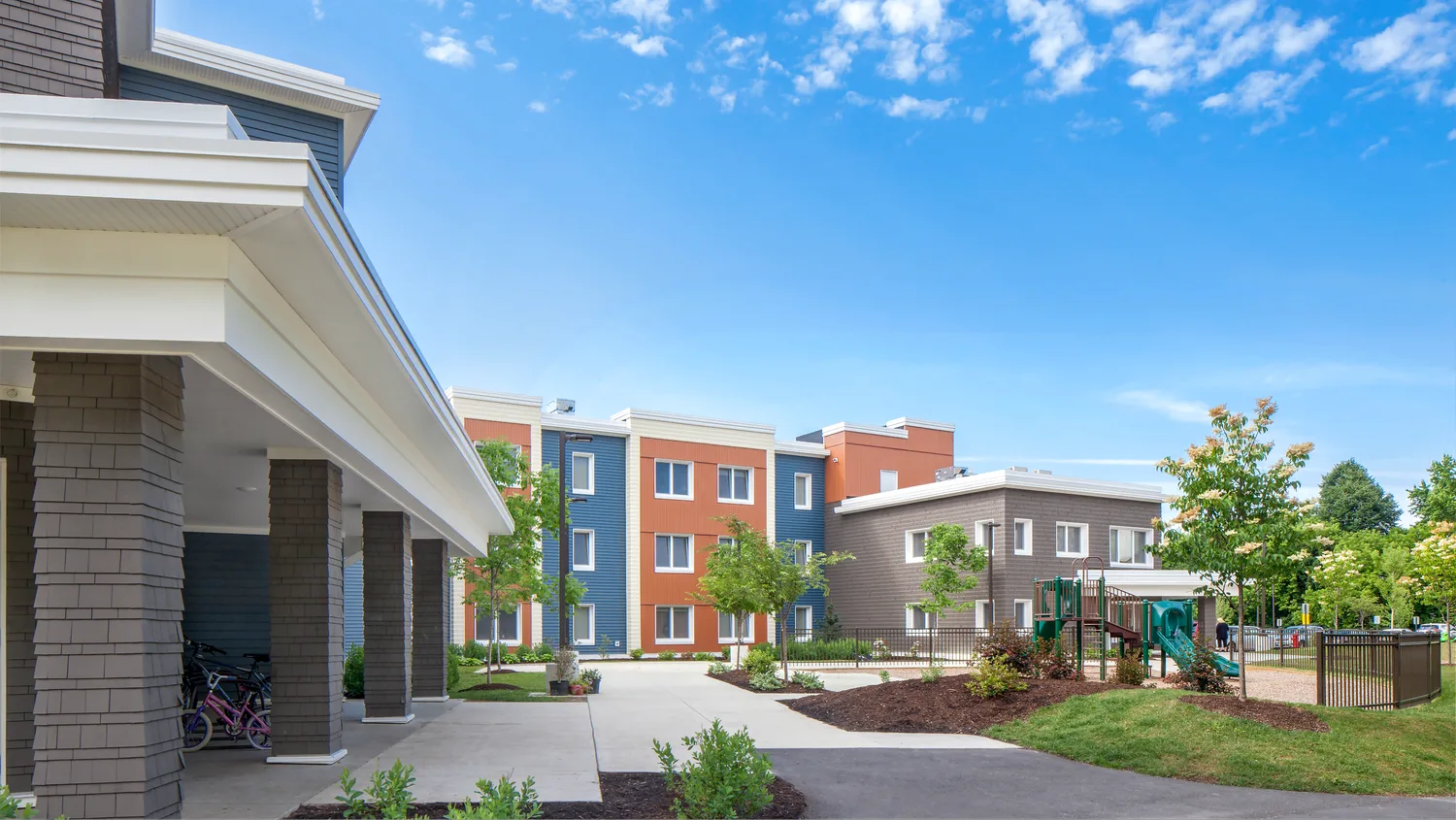 Courtyard and playground at Village Homes, an affordable Passive House development in Brewer, Maine.